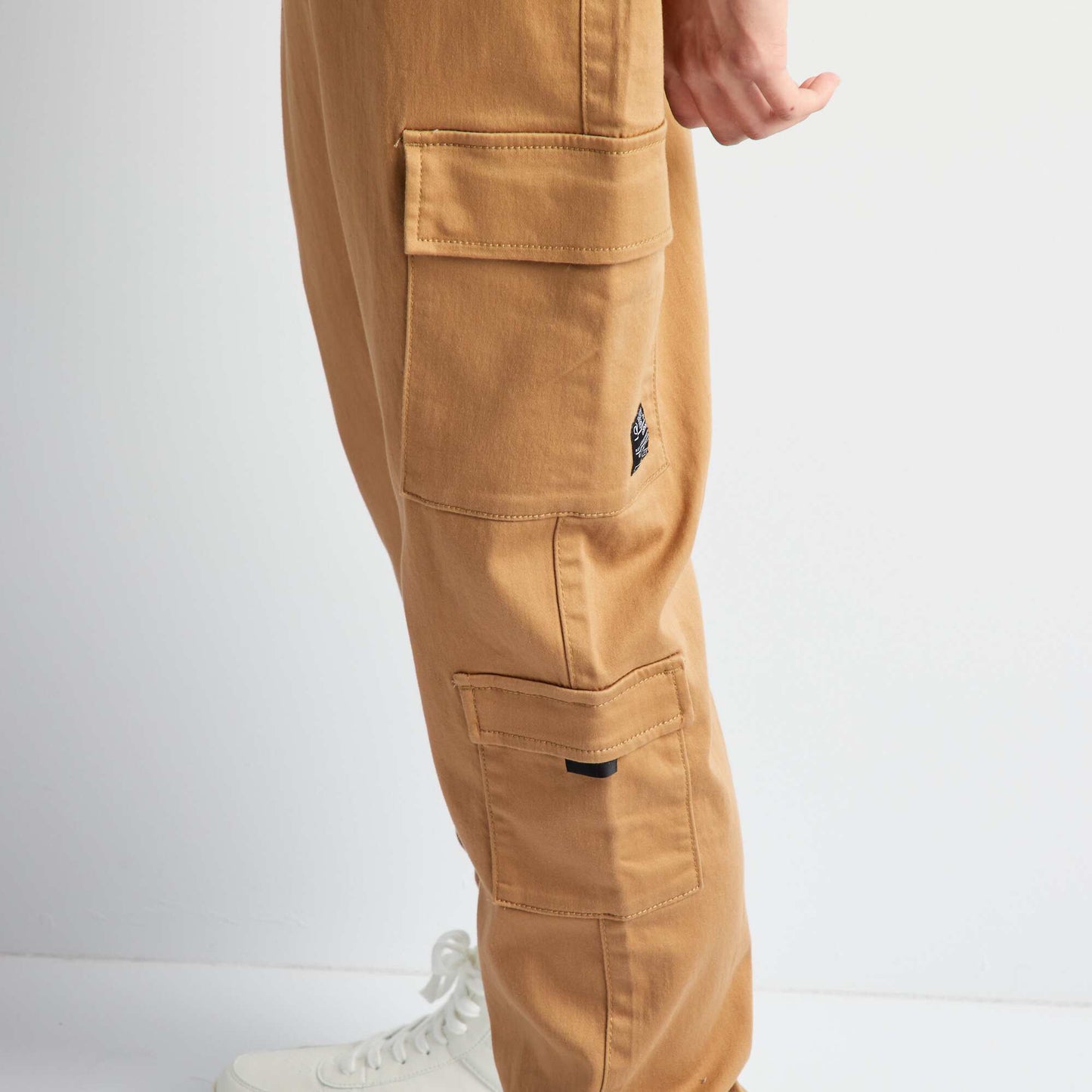 Pantalon avec poches sur les côtés Beige