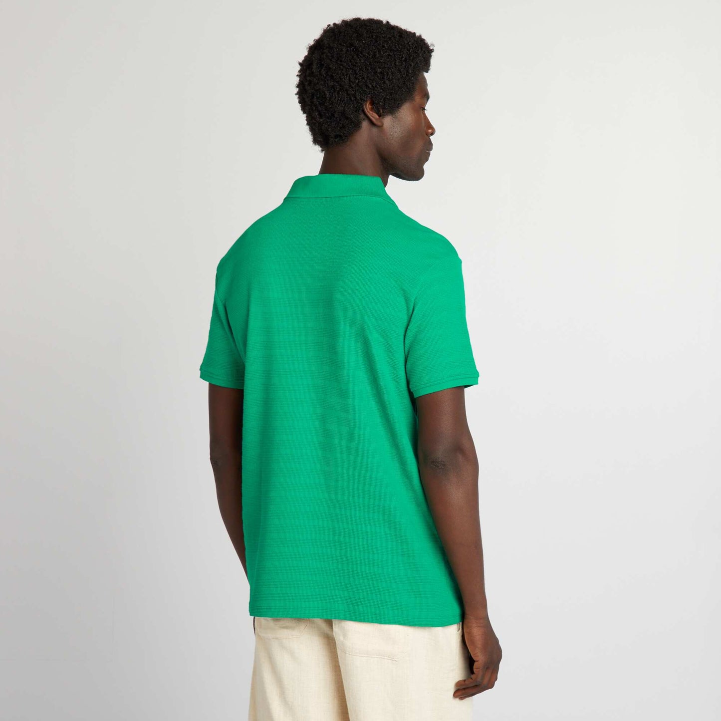 Polo en maille texturée à col V Vert