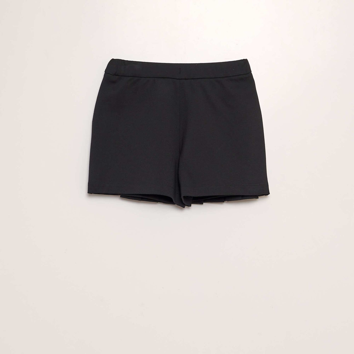 Jupe short plissée en jersey noir