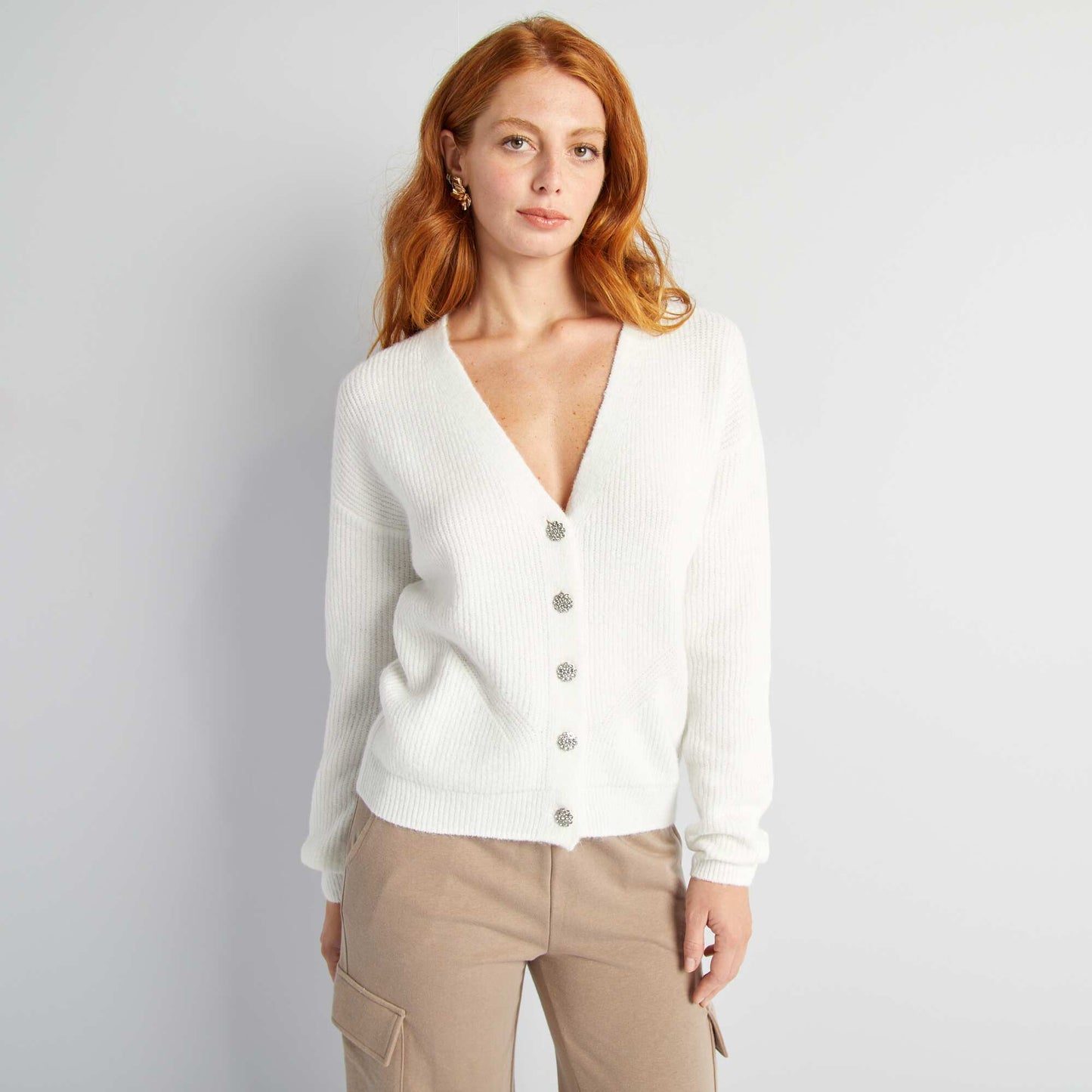 Gilet avec boutonnage fantaisie à strass blanc