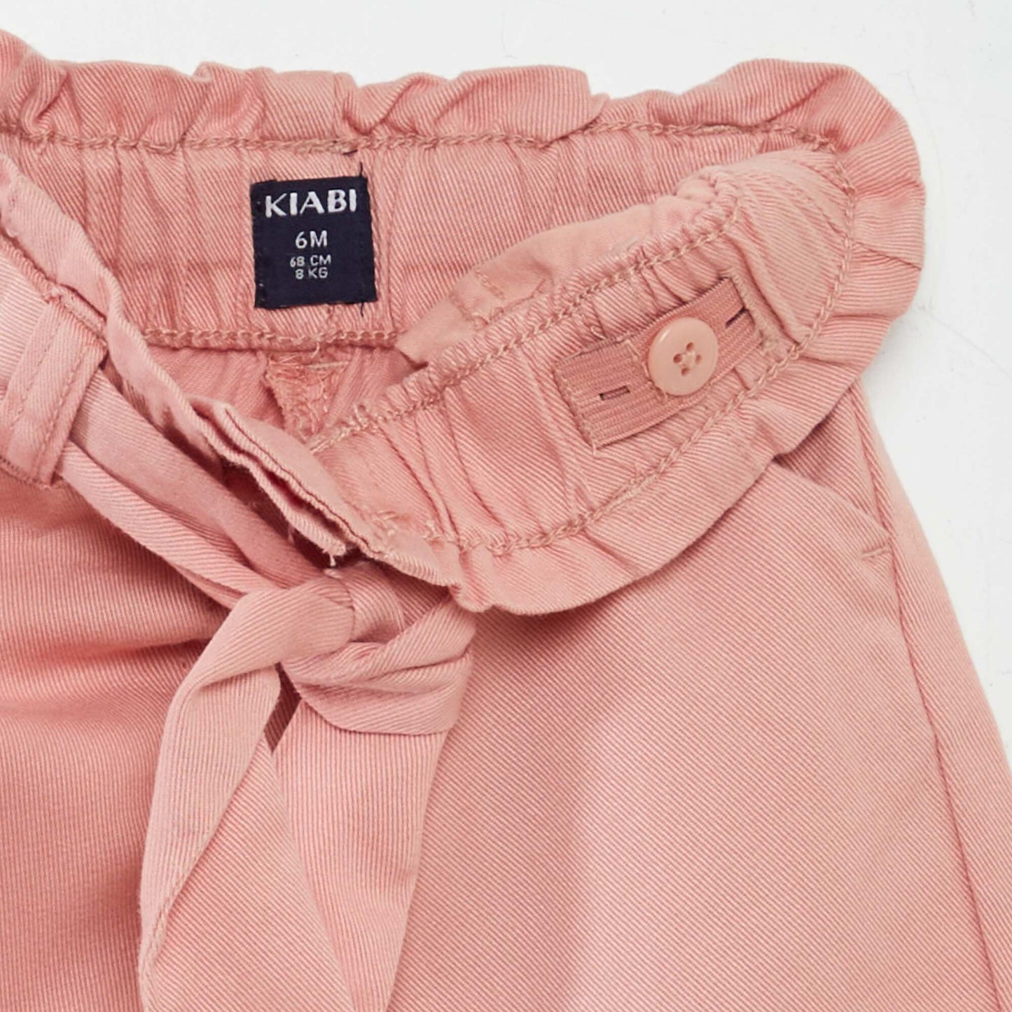 Pantalon uni avec ceinture et volants Rose