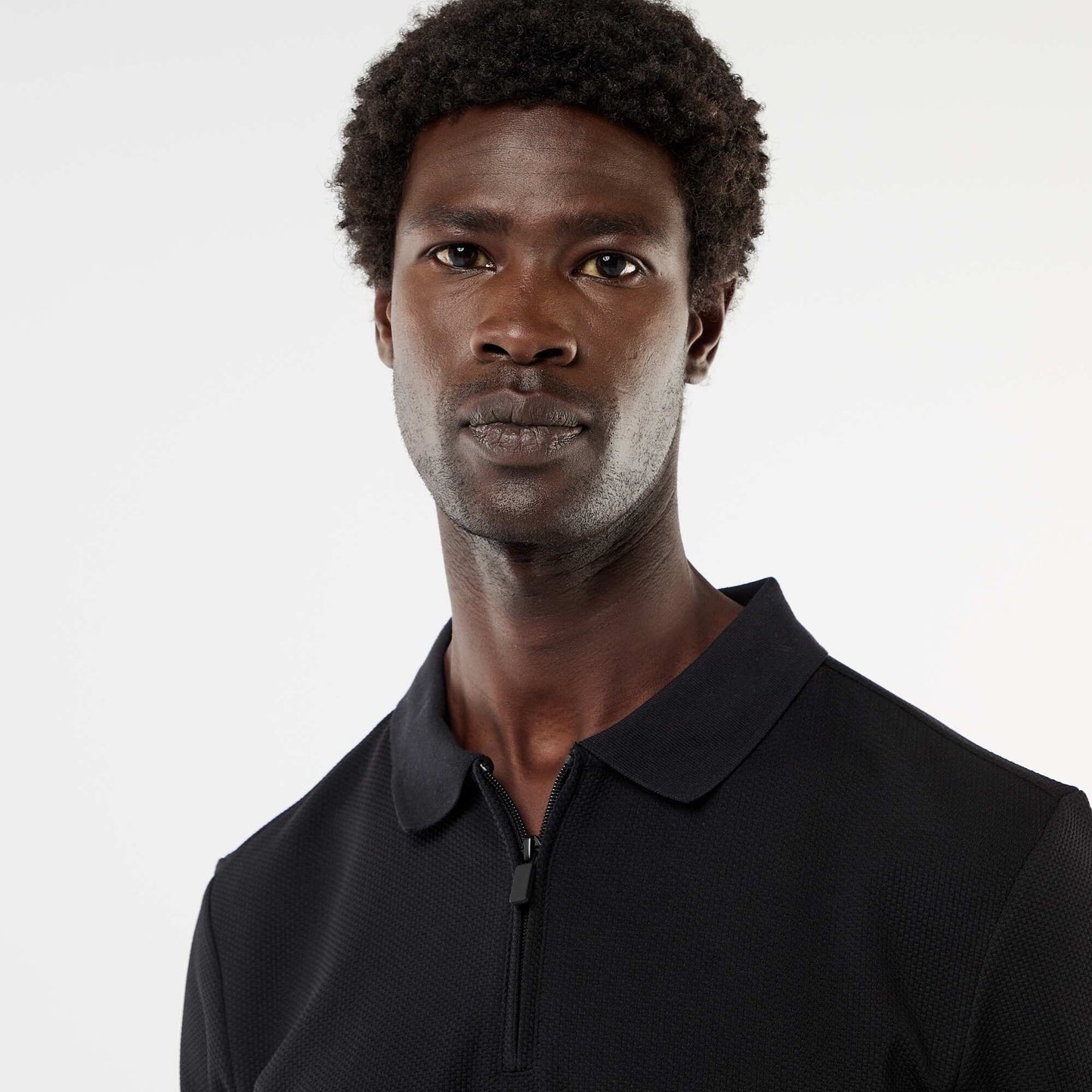 Polo homme à manches courtes avec col zippé en maille nid d'abeille NOIR