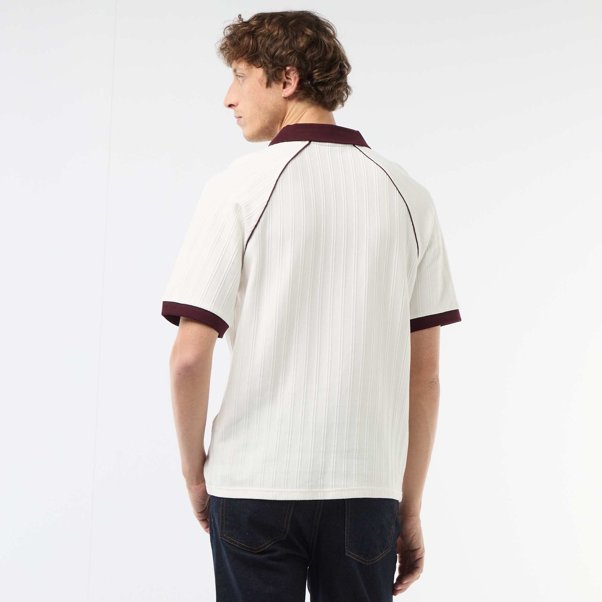Polo en matière fantaisie col polo sans boutons BLANC