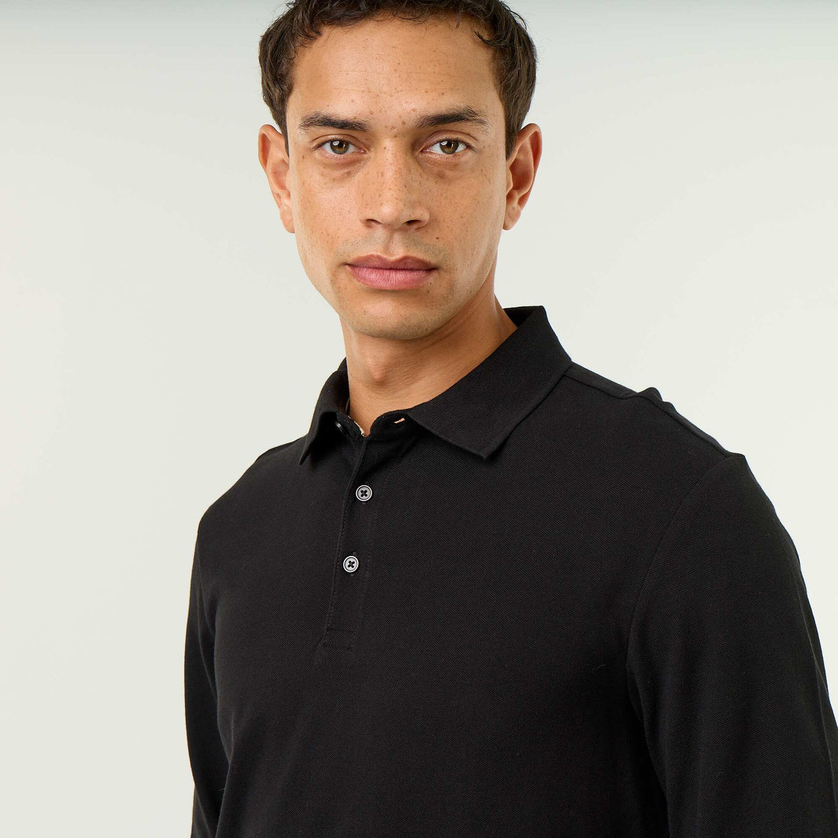 Polo en maille piquée manches longues NOIR