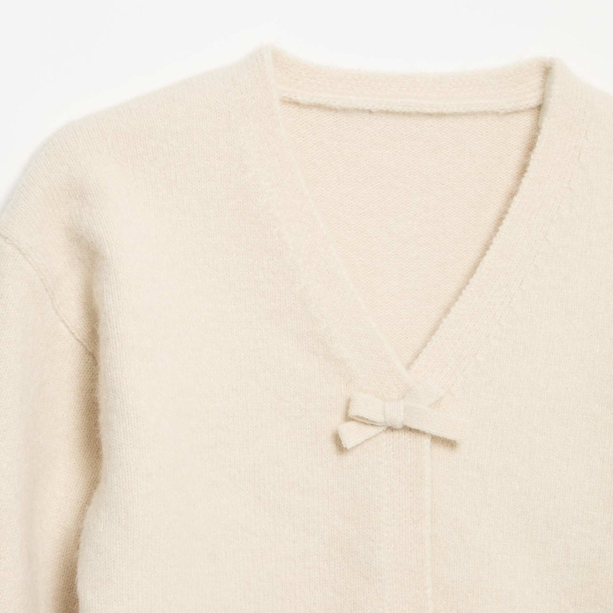 Pull en maille avec ouverture par nœuds BLANC