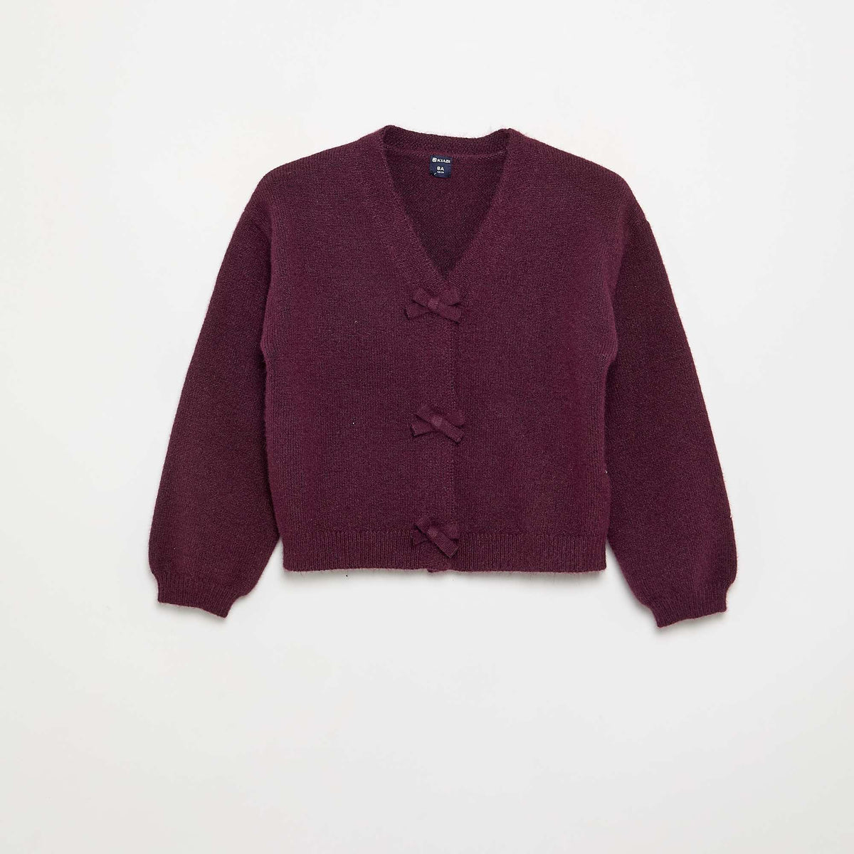Pull en maille avec ouverture par nœuds ROSE