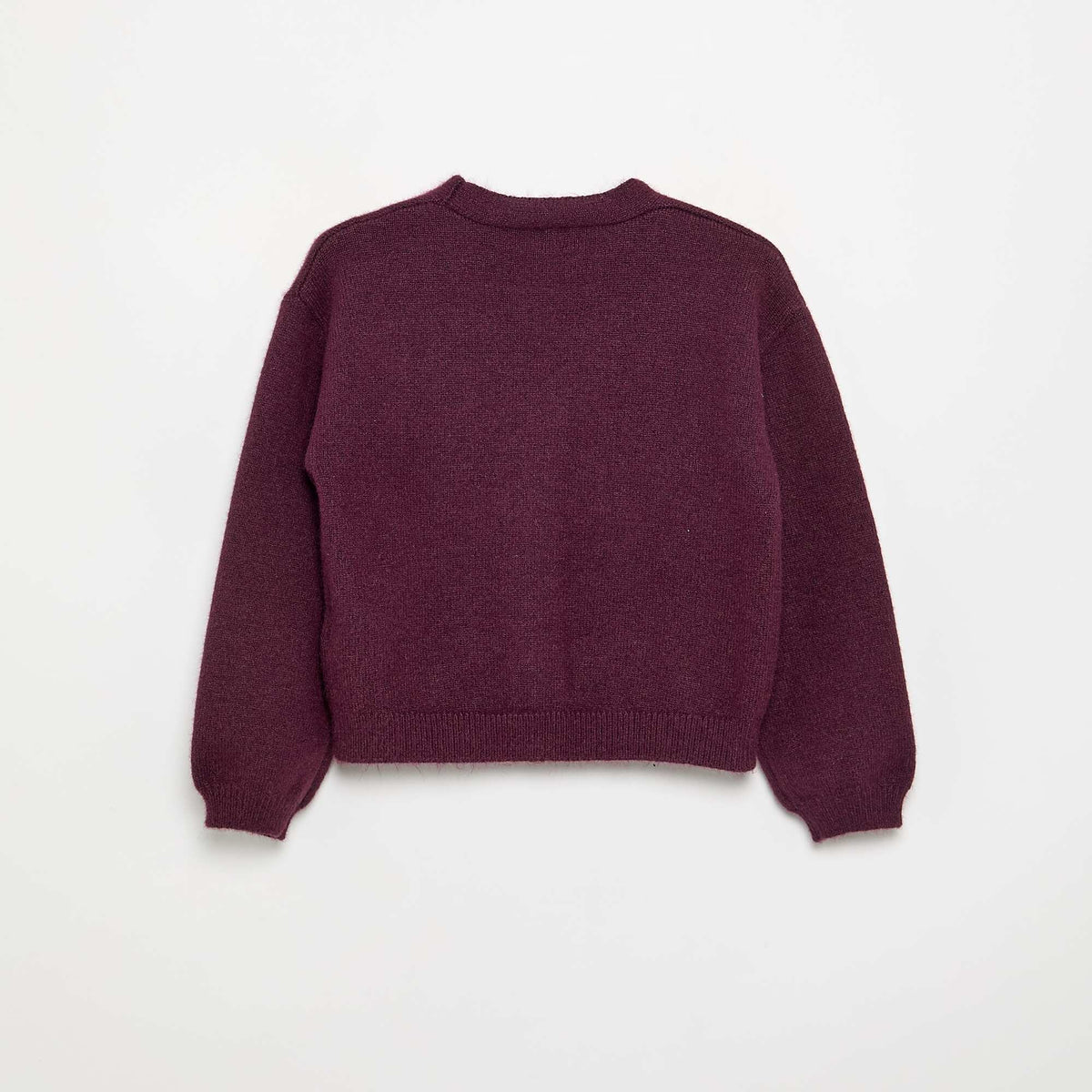 Pull en maille avec ouverture par nœuds ROSE