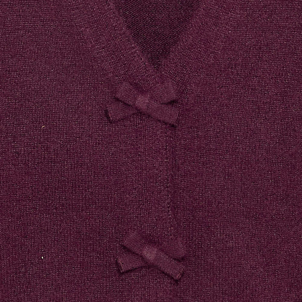 Pull en maille avec ouverture par nœuds ROSE